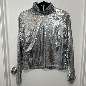 Sequin mock neck top! Zipper closure in back! Size small, brand new!Show stopper